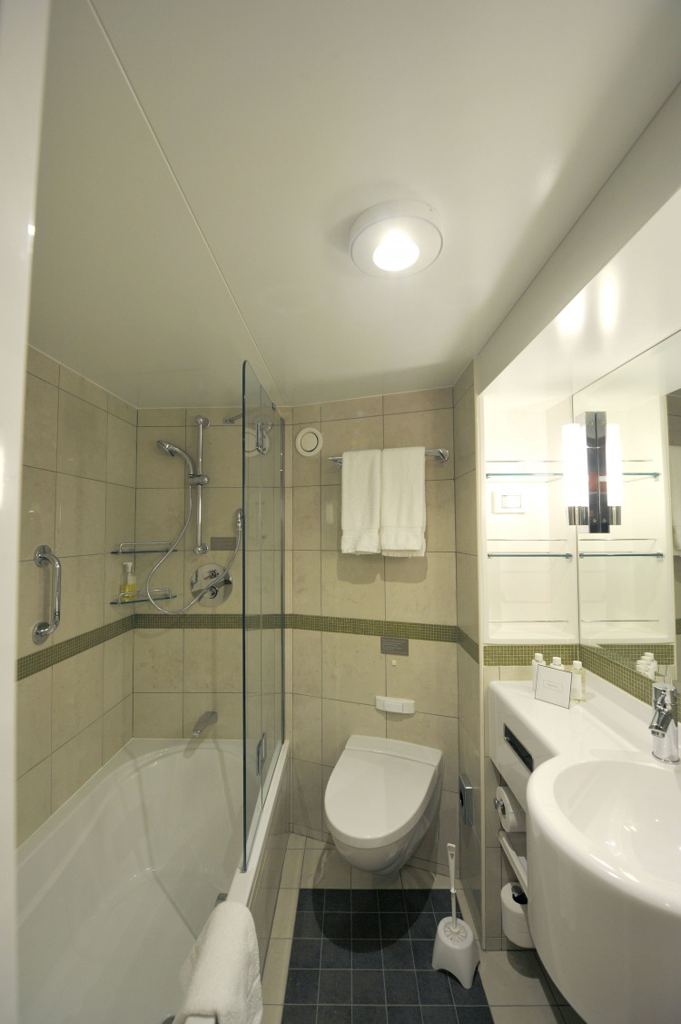 Super Deluxe Balcony Cabins P&O Cruises Britannia Accommodation Superior Bed Bath.jpg
