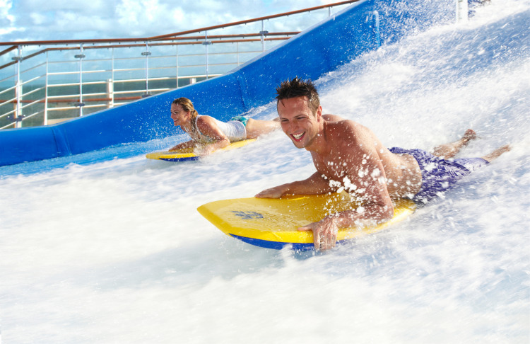 Flowrider Royal Caribbean International Oasis of the Seas Exterior Flowrider Couple 05 RET.jpg